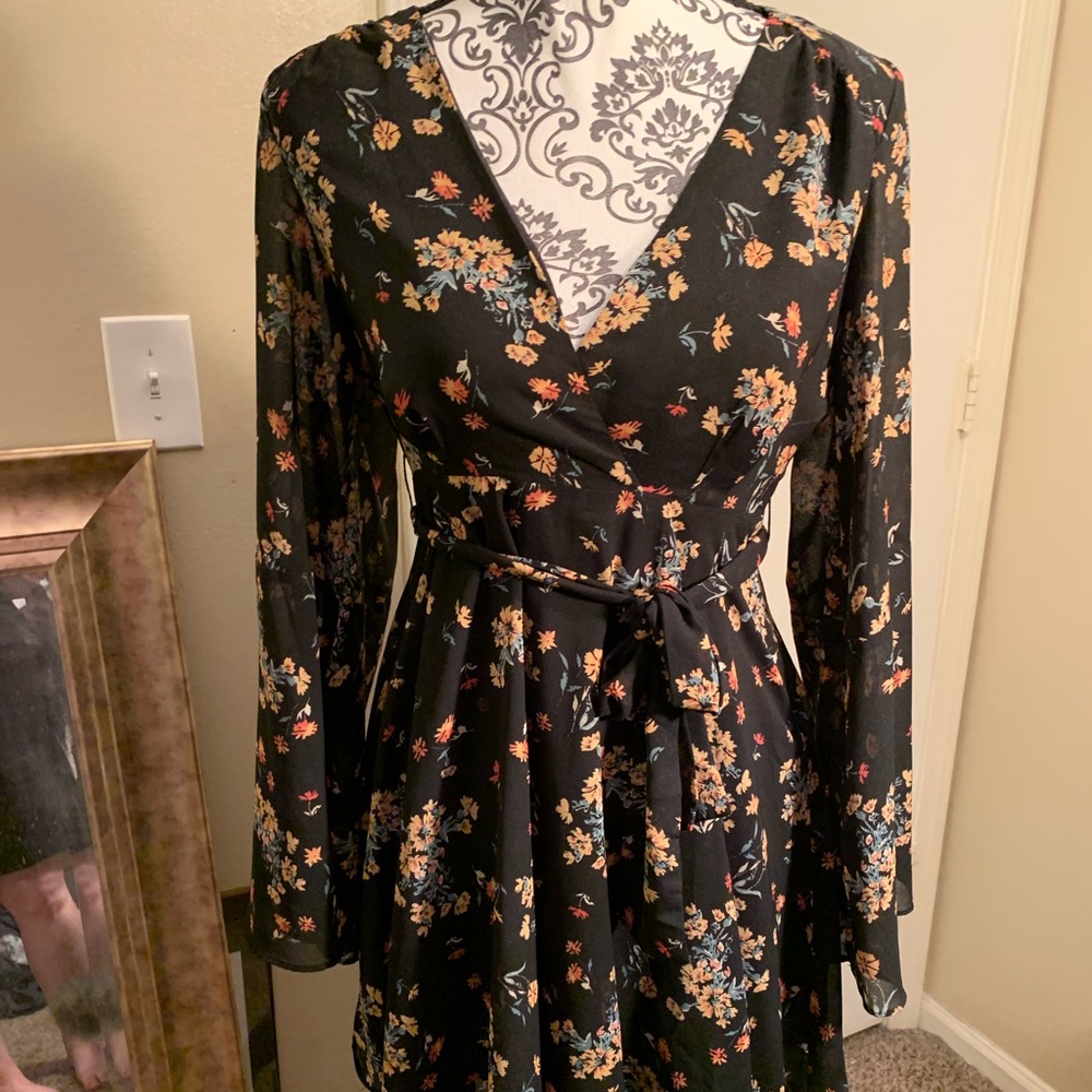 Free people. Size small. Black floral dress/tunic